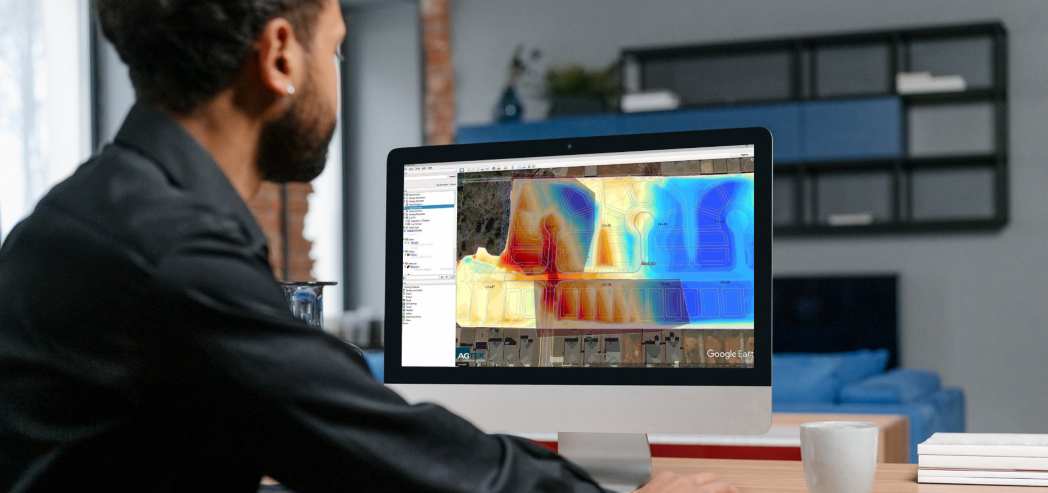 Man working on Gradework on a computer